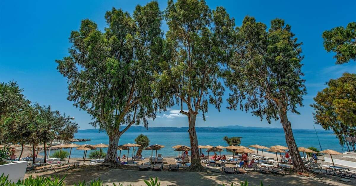 Een foto van het strand bij Evia Riviera Resort