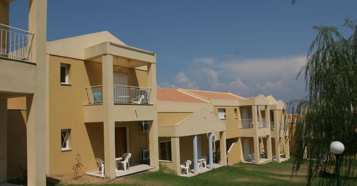 Een foto van de buitenkant van Olympion Village Hotel