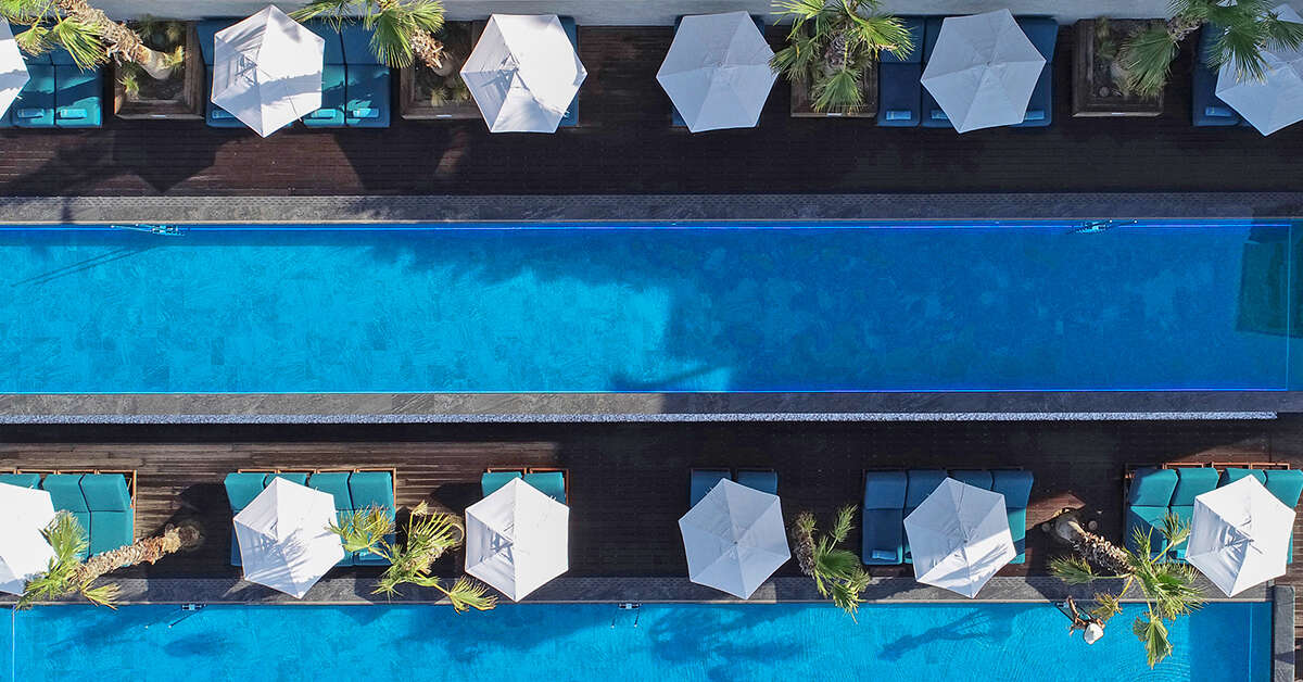 Een foto van het zwembad bij Mitsis Summer Palace Beach Hotel
