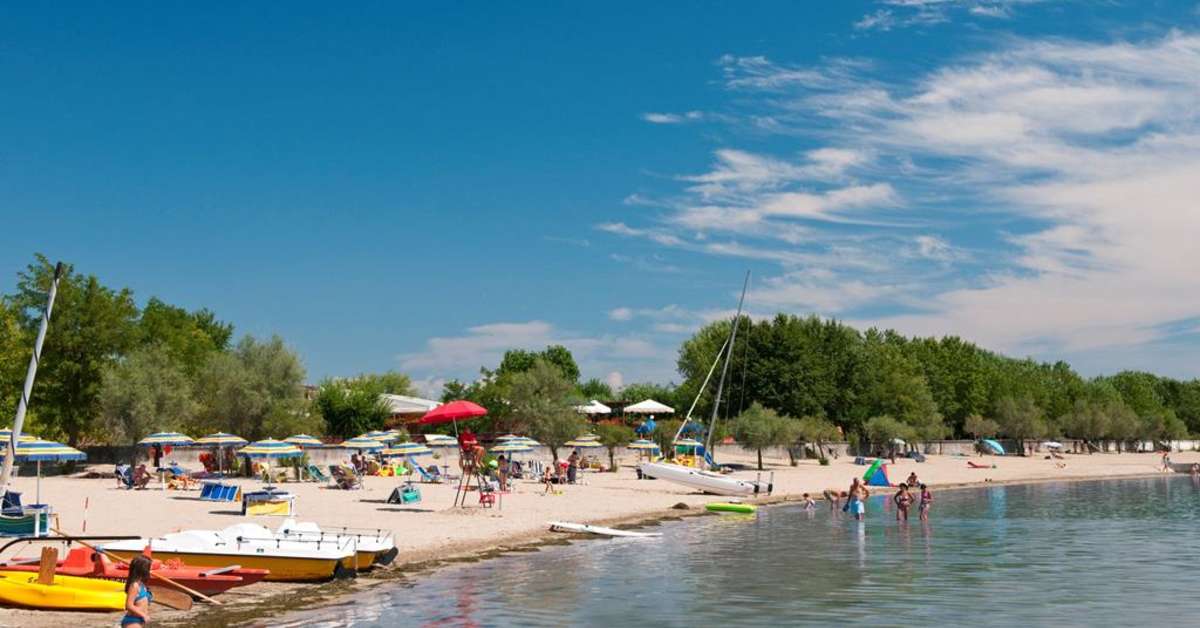Een foto van het strand bij Club Del Sole Tenuta Primero Grado Family Collection