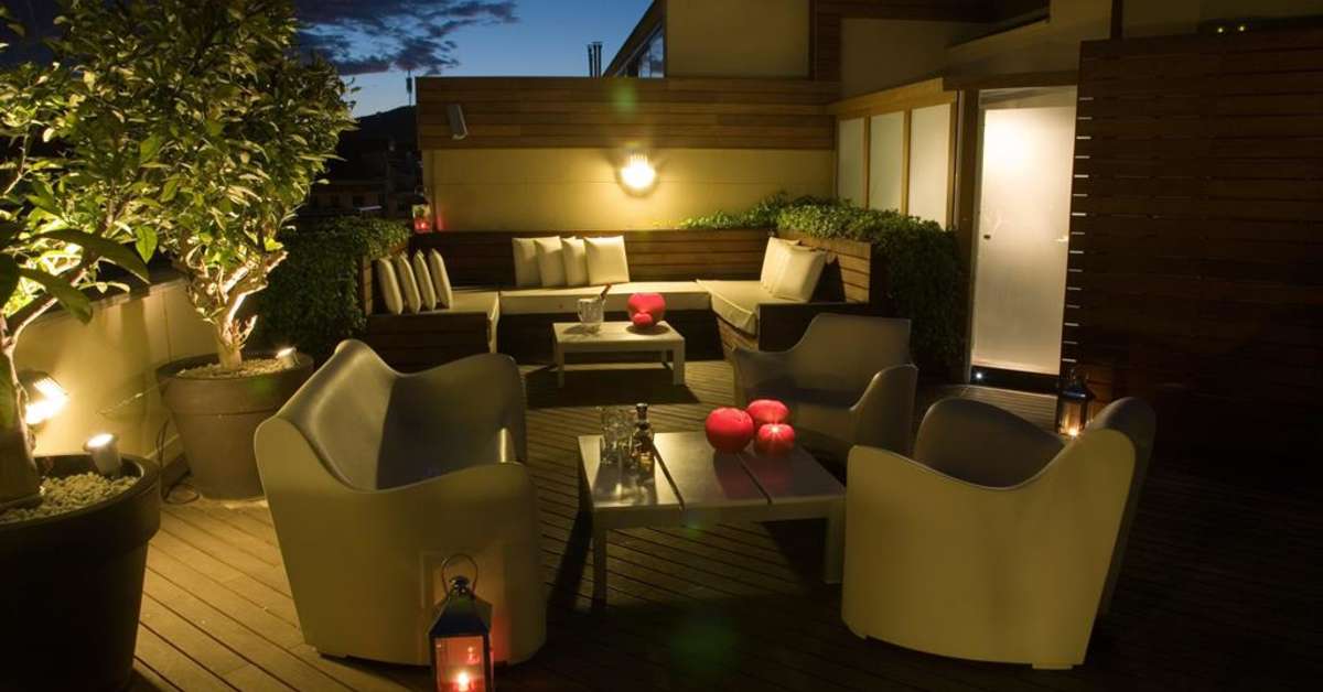 Een foto van het terras bij Hotel America