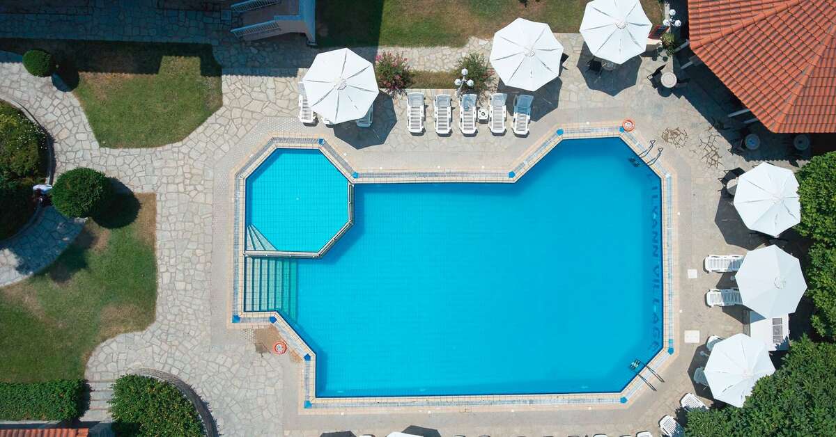 Een foto van het zwembad bij Acrotel Lily Ann Village