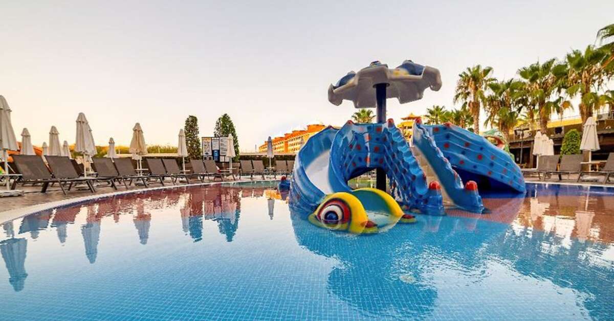 Een foto van het zwembad bij Calimera Hane Garden