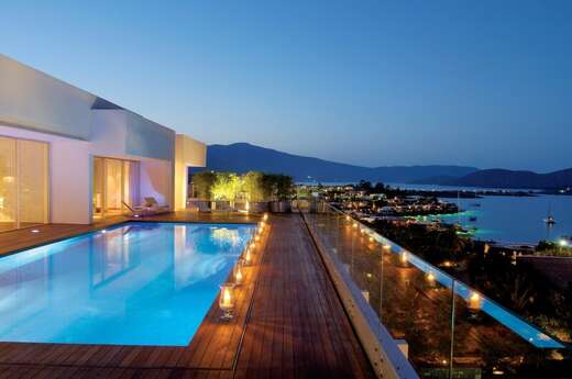 Een foto van het zwembad bij Elounda Beach Hotel & Villas