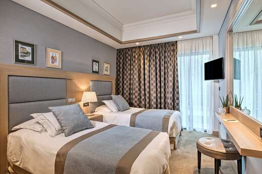 Ein Foto Rodos Park Suites & Spa Hotel