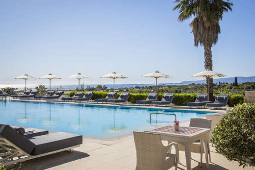 Een foto van het zwembad bij Astra Village Hotel & Spa