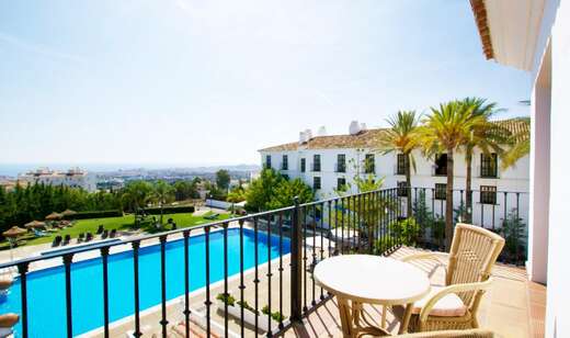 Een foto van het zwembad bij Ilunion Hacienda de Mijas
