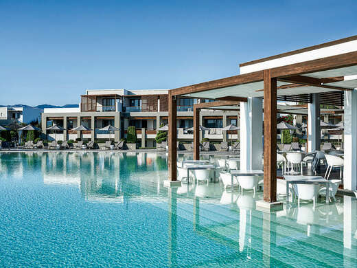 Een foto van het zwembad bij Pelagos Suites Hotel & Spa