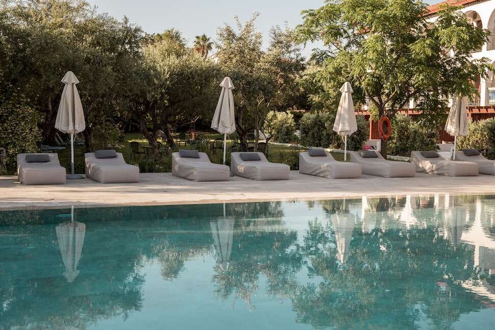 Een foto van het zwembad bij Castelli Hotel