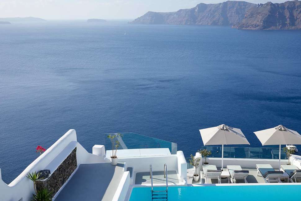 Een foto van het zwembad bij La Perla Villas & Suites