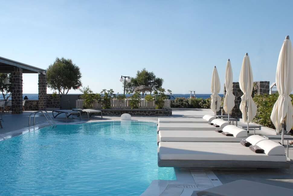 Een foto van het zwembad bij Aqua Blue Hotel