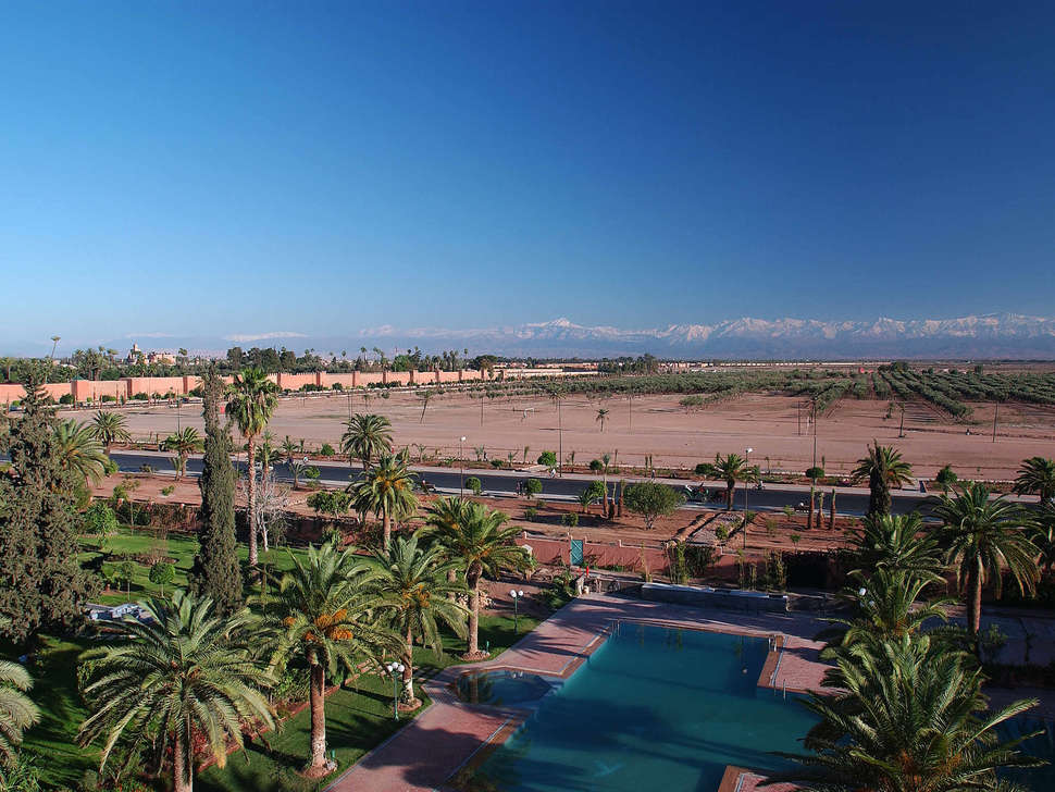 Een foto van het zwembad bij Ibis Marrakech Palmeraie