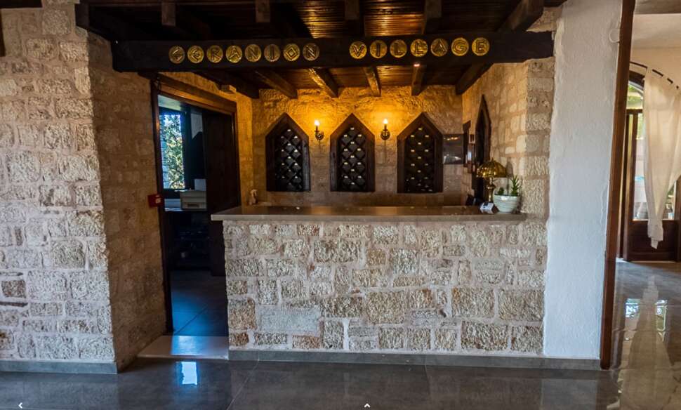Een foto van het interieur van Geranion Village
