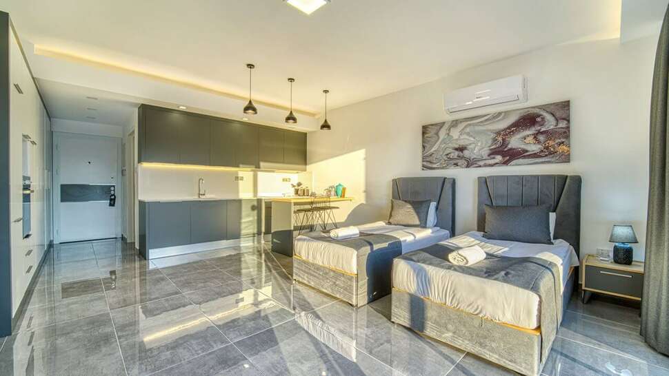 Ein Foto Courtyard Long Beach Holiday Resort