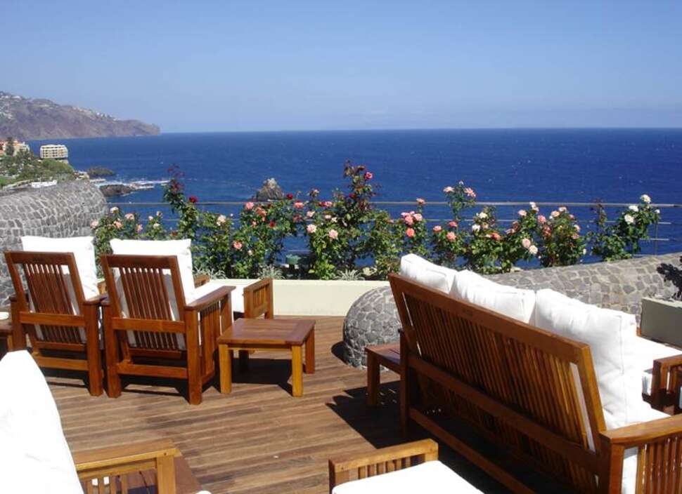 Een foto van het terras bij Madeira Regency Cliff Hotel
