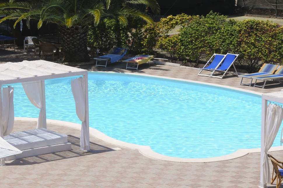 Een foto van het zwembad bij Hotel Village Fior di Sardegna