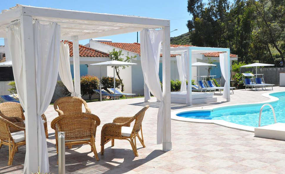 Een foto van het zwembad bij Hotel Village Fior di Sardegna