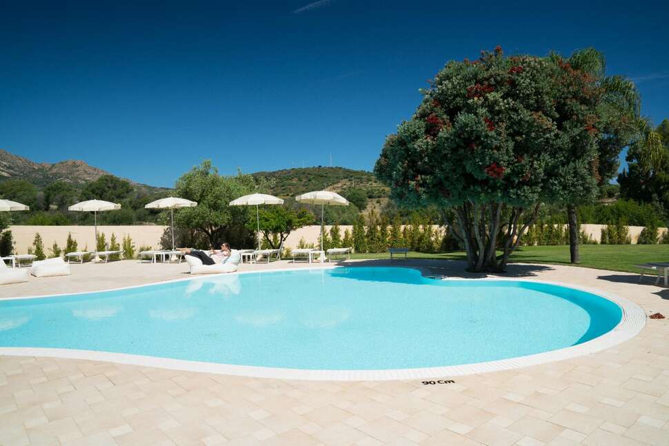 Een foto van het zwembad bij San Teodoro Hotel