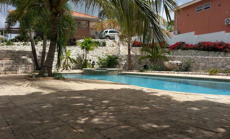Een foto van het zwembad bij Curinjo Resort