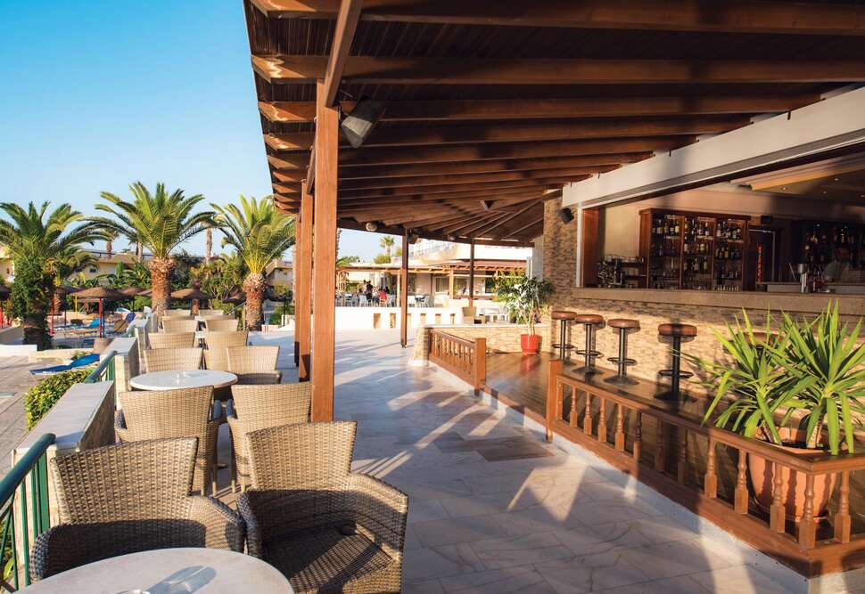Een foto van het terras bij Euro Village Achilleas Hotel