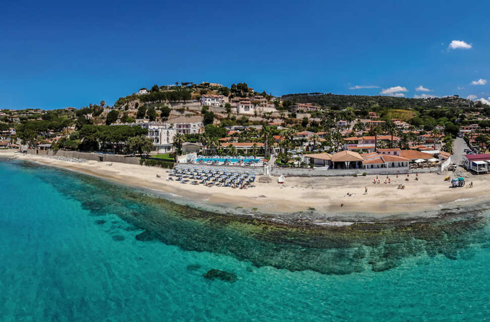 Een foto van het strand bij Villaggio Baia d'Ercole