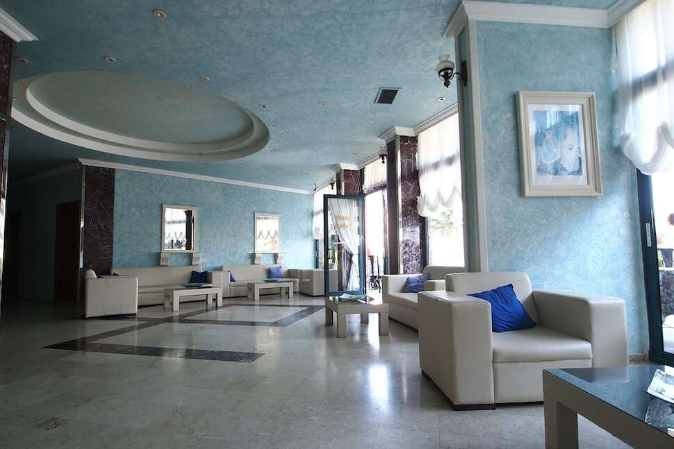 Een foto van het interieur van Class Beach Hotel