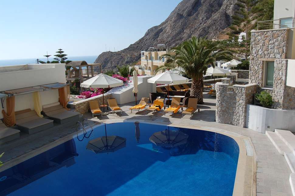 Een foto van het zwembad bij Antinea Suites & Spa