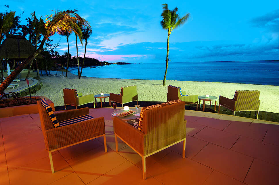 Een foto van het terras bij Ambre Resort & Spa