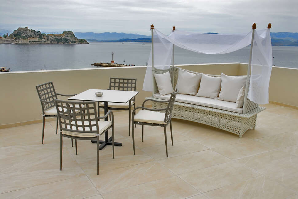 Een foto van het terras bij Mon Repos Palace Hotel