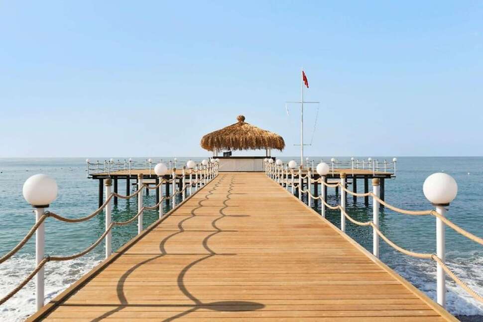 Een foto van het strand bij Ramada Resort by Wyndham Lara