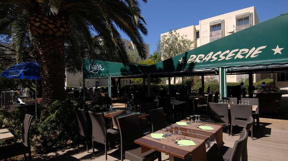 Een foto van het terras bij Ile D'Or & Les Oceanides