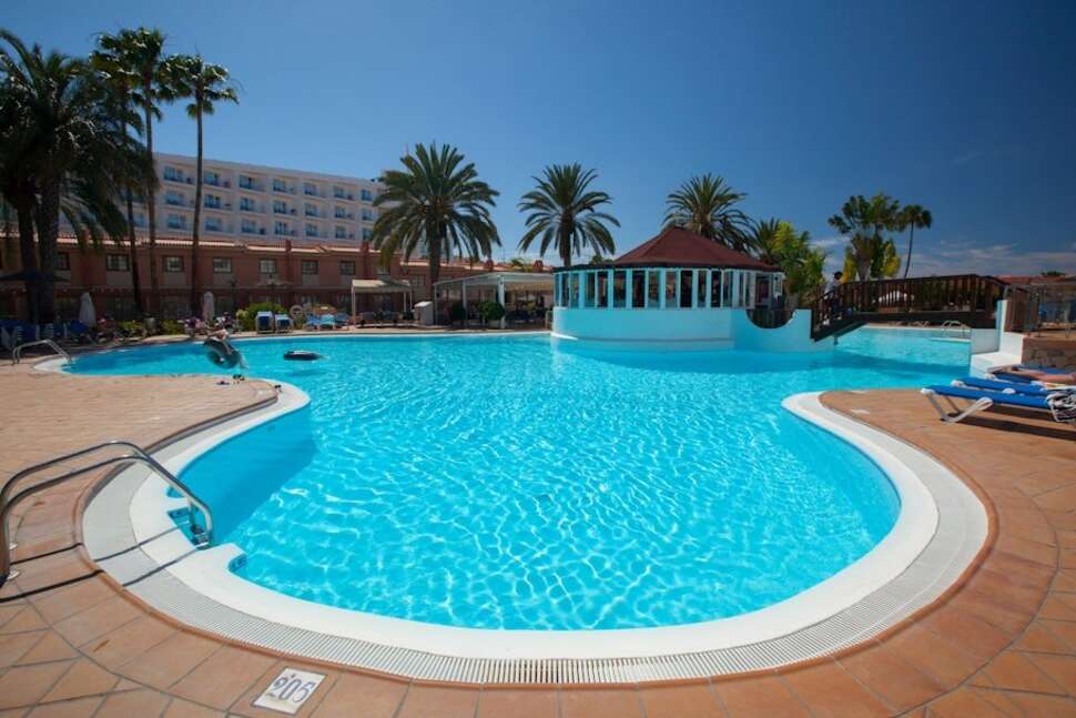 Een foto van het zwembad bij Sholeo Lodges Maspalomas