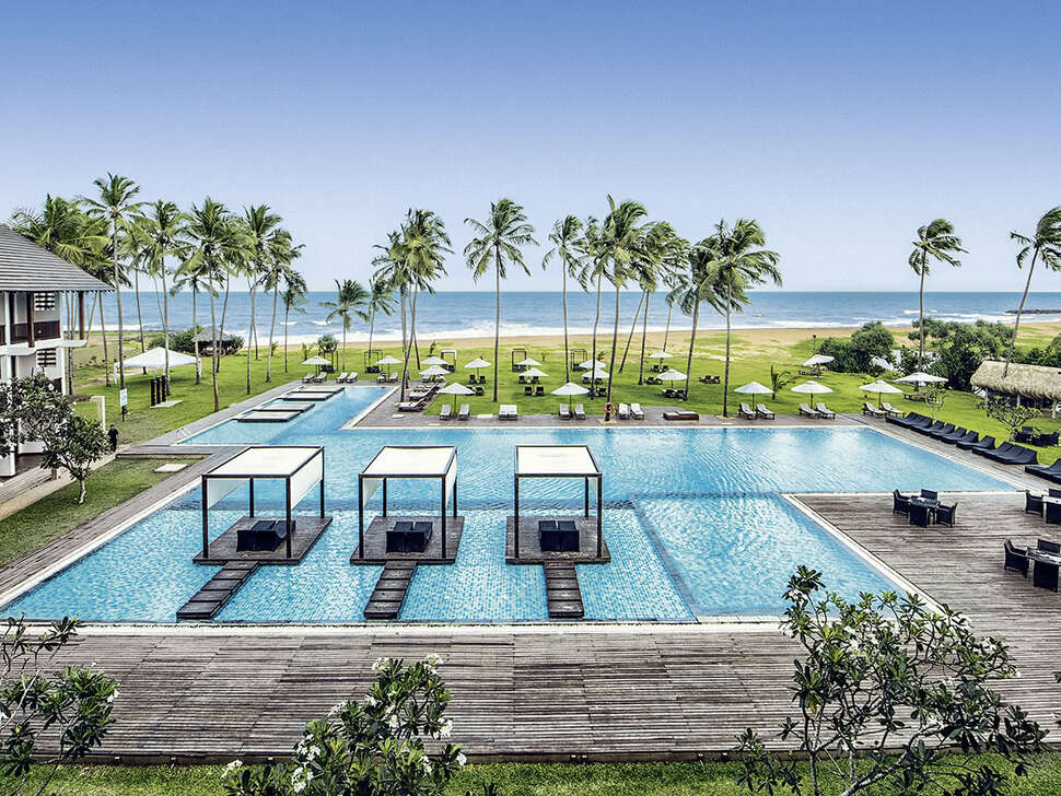 Een foto van het zwembad bij Suriya Luxury Resort