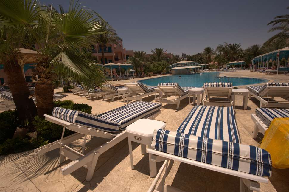Een foto van het zwembad bij Le Pacha Resort
