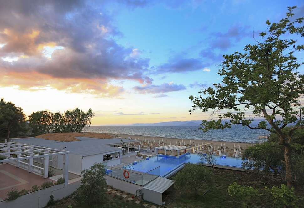 Een foto van het zwembad bij Cavomarina Beach Hotel