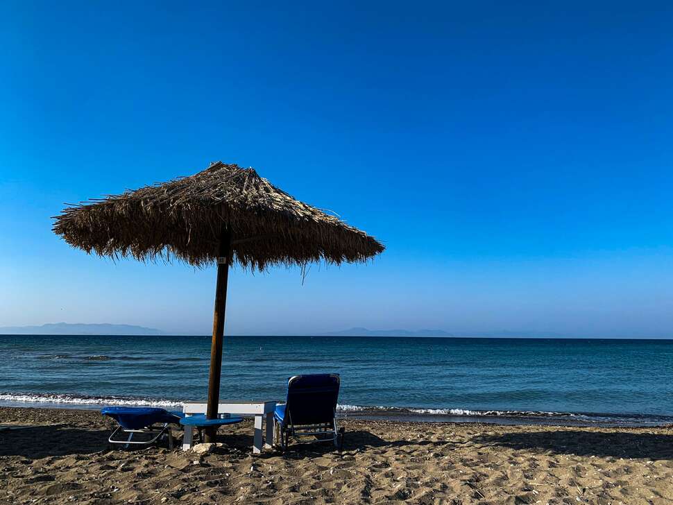 Een foto van het strand bij White Palace Studios