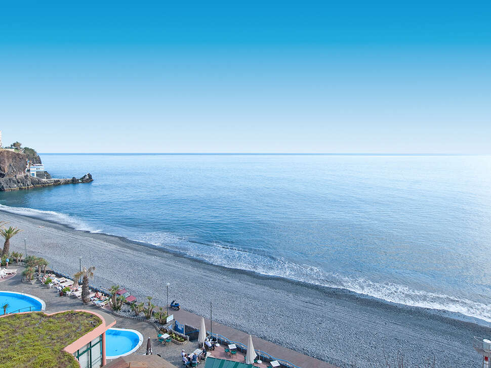 Een foto van het strand bij Pestana Ocean Bay