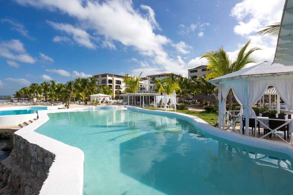 Een foto van het zwembad bij HM Alma de Bayahibe