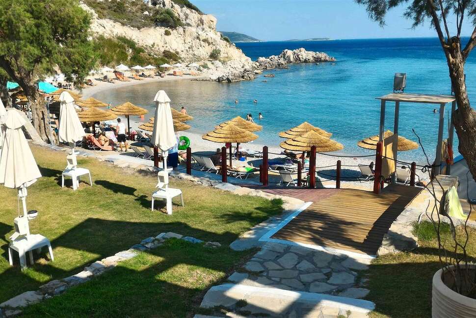 Ein Foto vom Strand beim Glicorisa Beach Hotel