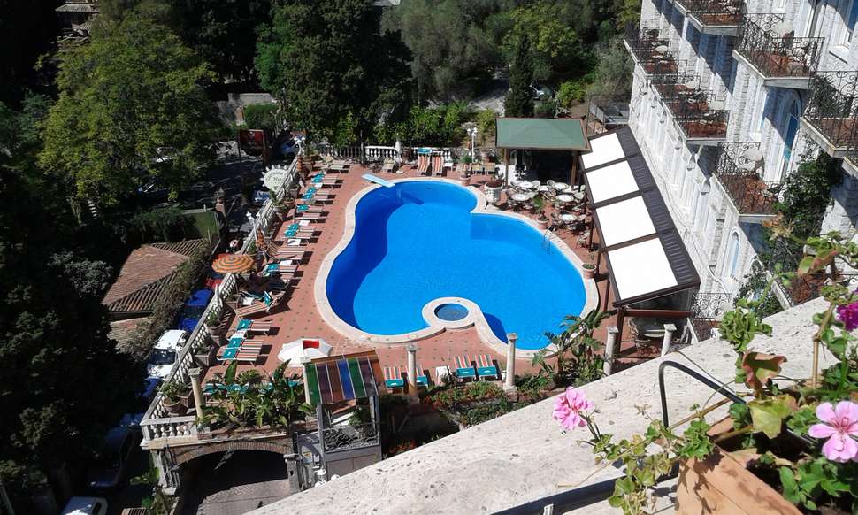 Een foto van het zwembad bij Taormina Park Hotel