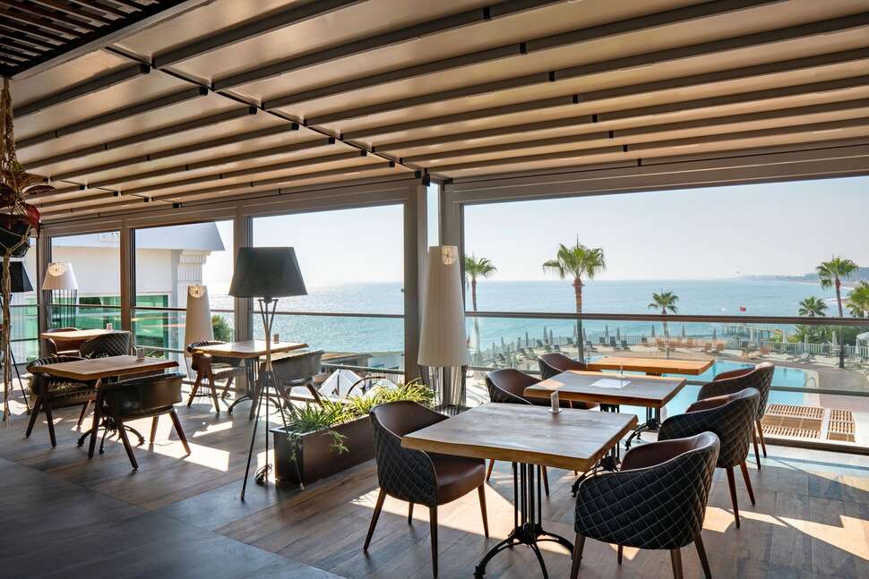 Een foto van de faciliteiten bij Flora Garden Beach Hotel