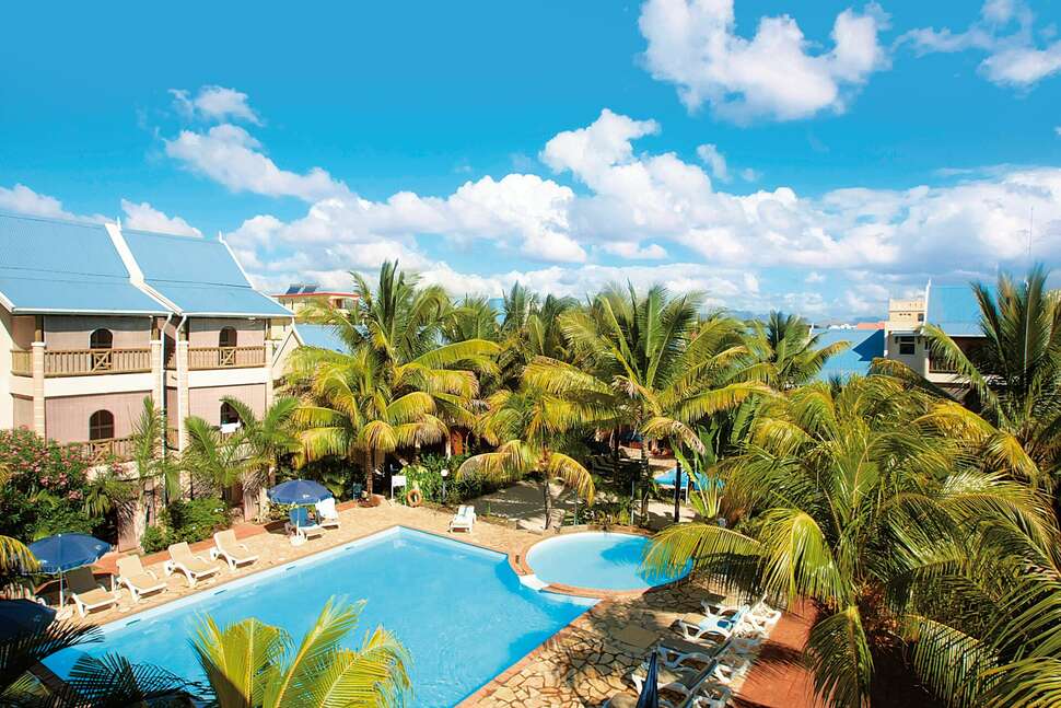 Een foto van het zwembad bij Le Palmiste Resort & Spa