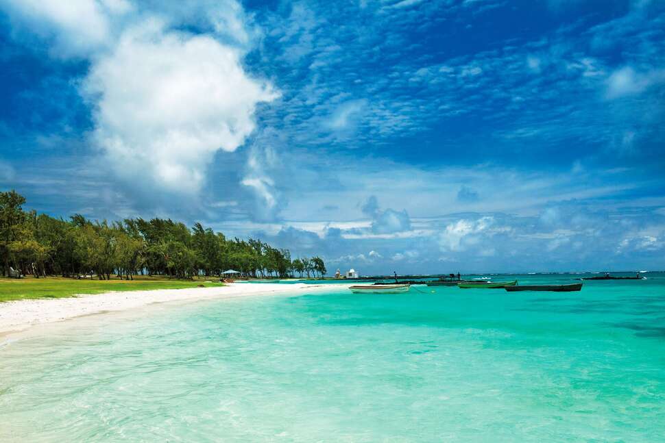Ein Foto vom Strand beim Sunrise Attitude