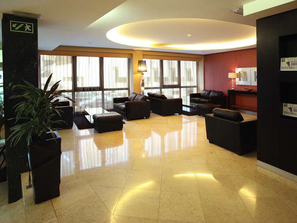 Een foto van het interieur van Turim Europa Hotel