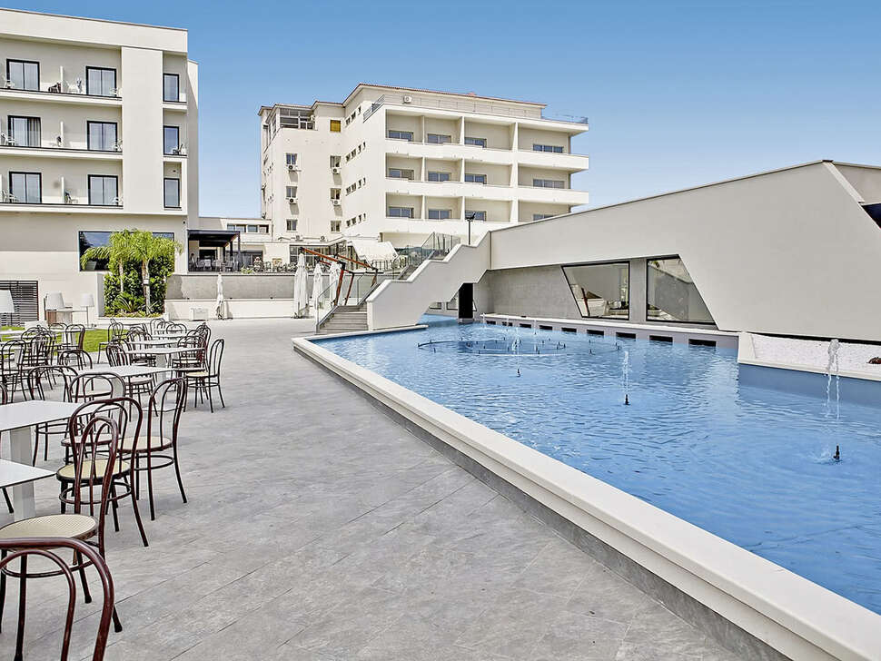 Een foto van het zwembad bij Hotel Santa Lucia Le Sabbie d’Oro