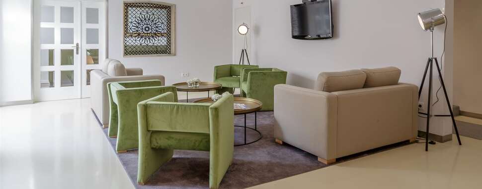Een foto van het interieur van Porto Domus Hotel