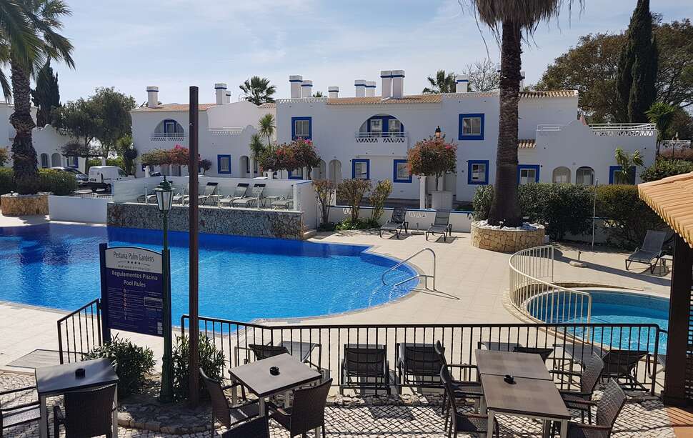 Een foto van het zwembad bij Pestana Palm Gardens