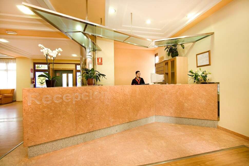 Een foto van het interieur van Hotel Monarque Cendrillon