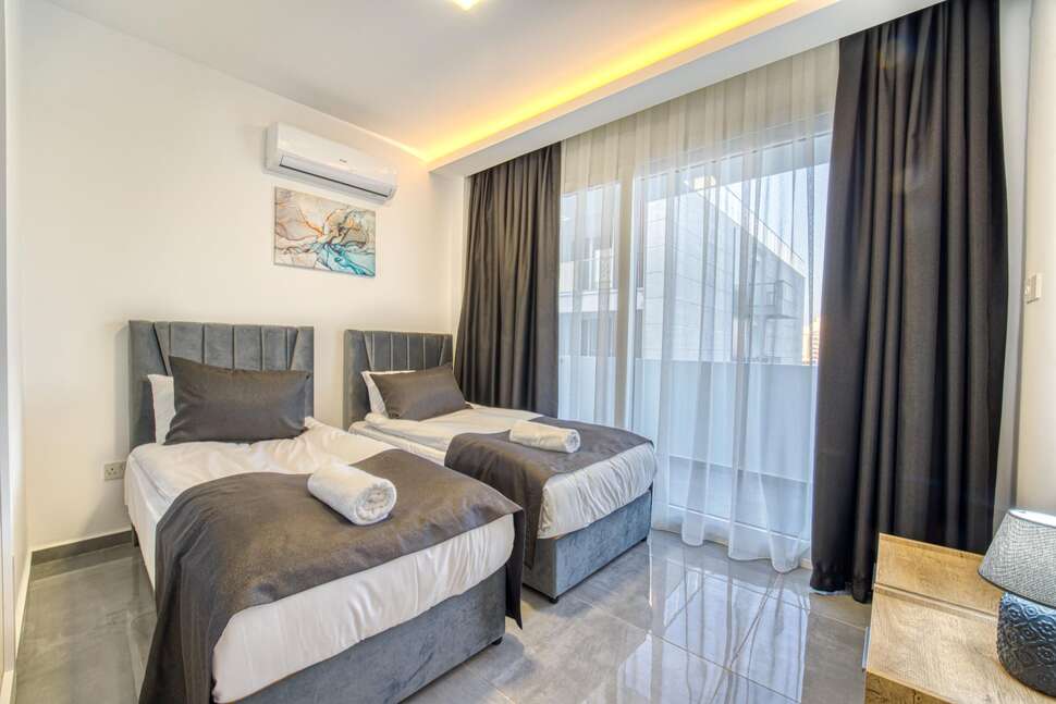 Ein Foto Courtyard Long Beach Holiday Resort