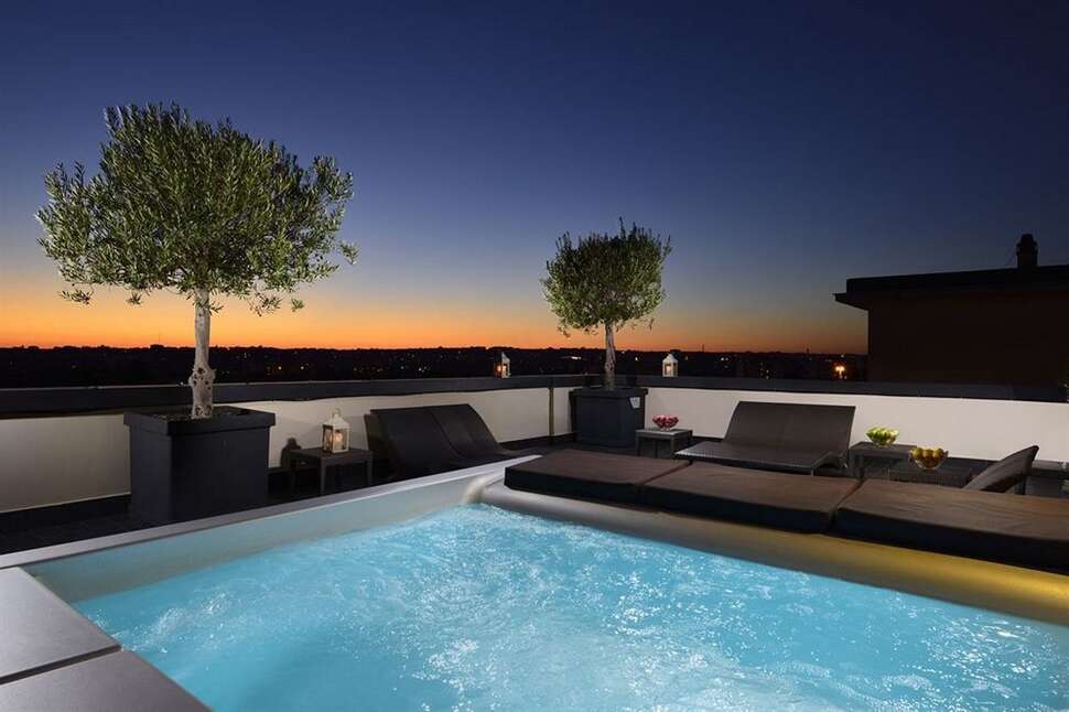 Ein Foto vom Pool im Hotel Pulitzer Roma